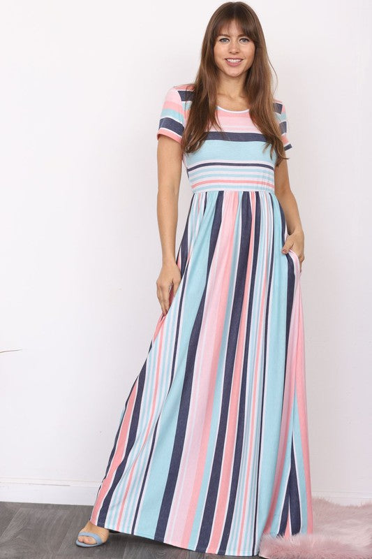 Experience the ultimate in elegant style with PinkBlu02 The Shea, our Plus-sized Short Sleeve Stripe Maxi Dress. Crafted in the USA using a blend of premium materials including polyester, rayon, and spandex, this dress offers the perfect combination of fashion and comfort. Versatile and sophisticated, you'll feel poised and stylish in this one-of-a-kind creation.