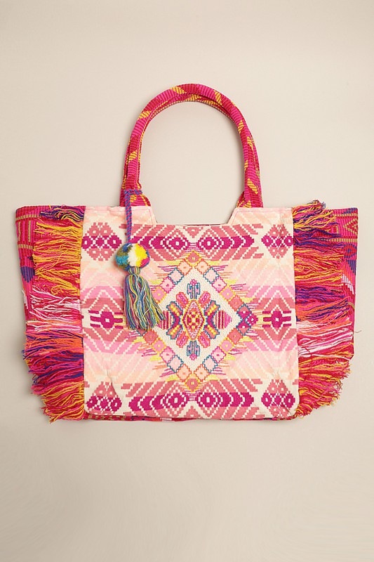 With its spacious interior, the Bohemian Bliss Tote Bag is perfect for carrying all your essentials, whether you’re heading to the beach, a festival, or a casual day out. You'll absolutely love this bohemian tassel bag ! 