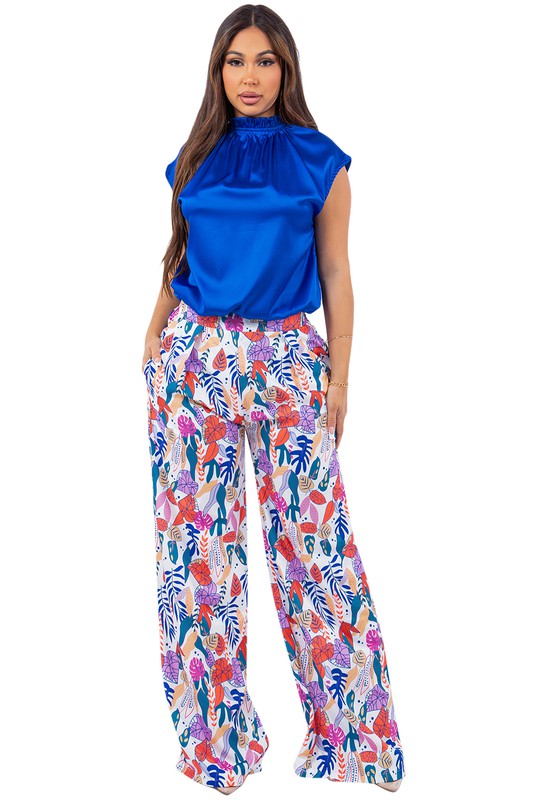  evening palazzo pant set  boast a vibrant floral pattern that adds a touch of whimsy and sophistication to your look, while the wide-leg design ensures a flattering and comfortable fit.