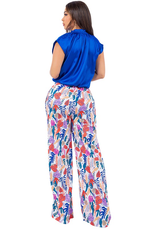 Whether you’re attending a special event or enjoying a casual outing, the Royal Bloom Palazzo Pant Set is designed to make you stand out. Embrace the fusion of floral elegance and satin sophistication with this versatile and stylish set. 