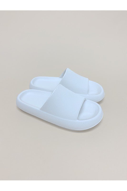 These slides are designed to provide a plush, cushioned feel with every step, making them perfect for all-day wear. Crafted from high-quality, soft, and flexible materials, these slides offer a cloud-like experience for your feet.