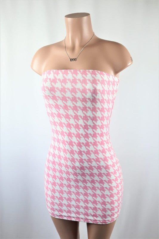 Light pink tube dress houndstooth mini dress. 95% Polyester 5% Spandex Double layered...pair with tights, jacket & boots for a great fall look!