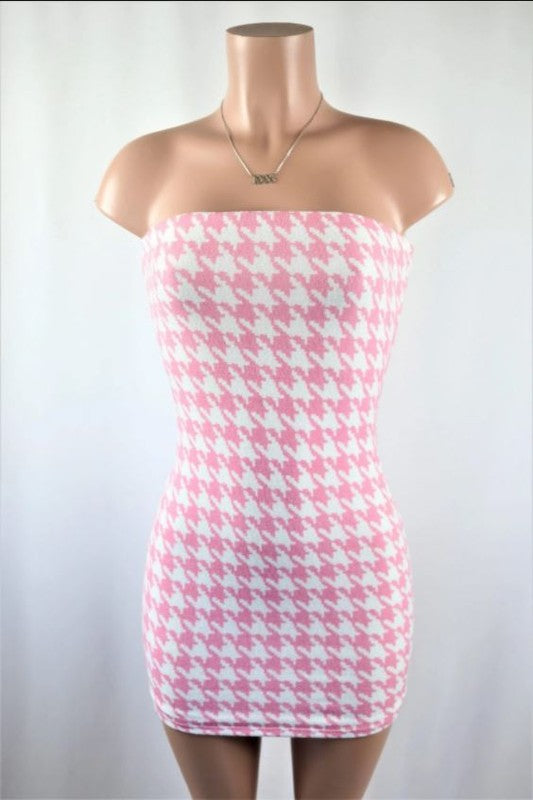 Light pink tube dress houndstooth mini dress. 95% Polyester 5% Spandex Double layered...pair with tights, jacket & boots for a great fall look!