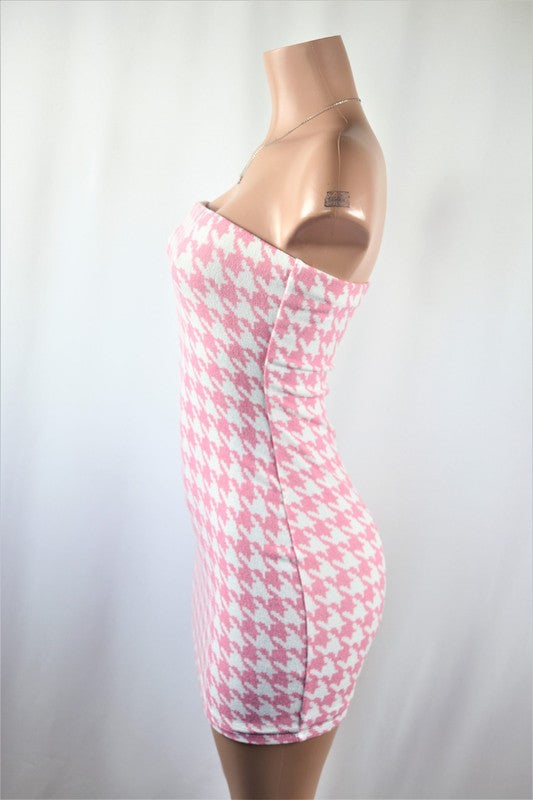 Light pink tube dress houndstooth mini dress. 95% Polyester 5% Spandex Double layered...pair with tights, jacket & boots for a great fall look!