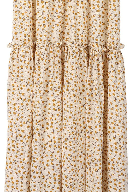 Create an enduring summer outfit with this SaliLue tank dress. It features a low cut V-neck and sleeveless construction, and comes in a bright yellow floral print. The dress is lined for opacity and should be machine washed cold for easy care. The length for a size Small is approximately 48".