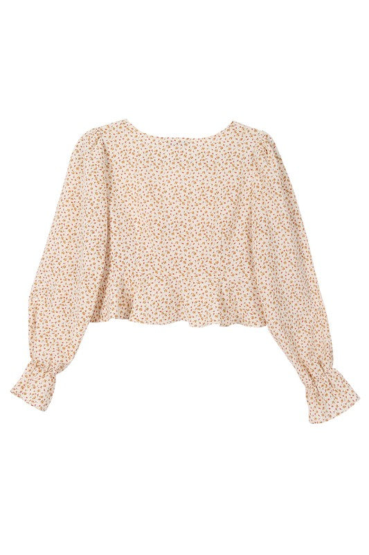 This Flora Floral Frill Blouse is the perfect addition to your wardrobe. Featuring a stylish floral pattern, a flattering V neck and puff sleeves. Crafted from a non-stretch material, it is not lined but not very sheer. To ensure its quality and longevity, machine wash cold and tumble dry low. Model is 5' 6" and wearing size Small; length is approx 17" in size Small.